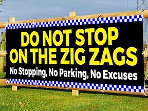 DO NOT STOP ON THE ZIG ZAGS