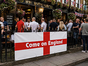 550gsm commercial grade England banner with eyelets displayed outside a traditional British pub